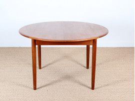 Table de repas scandinave ronde, en teck. 4 à 6 pers.