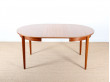 Scandinavian round dining table in teak. 4/6 seats