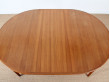 Scandinavian round dining table in teak. 4/6 seats