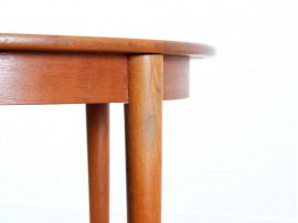 Table de repas scandinave ronde en teck. 4/6 personnes