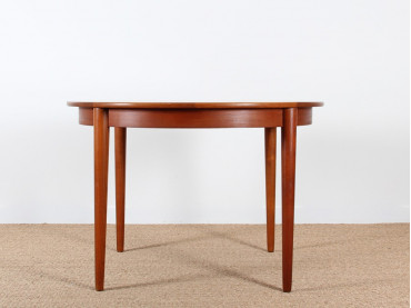 Table de repas scandinave ronde en teck. 4/6 personnes