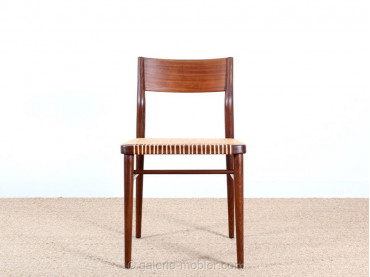 Set of 6  chairs in teak and cane. 