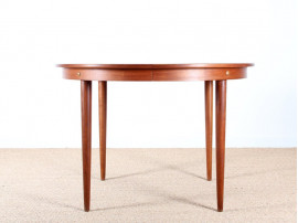 Scandinavian extendable round table in teak,  4/10 seats.