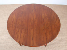 Scandinavian extendable round table in teak,  4/10 seats.