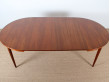 Scandinavian extendable round table in teak,  4/10 seats.