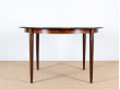 Extendable round dining table in rosewood, 4/8 seats.