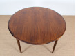 Extendable round dining table in rosewood, 4/8 seats.