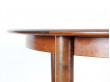 Extendable round dining table in rosewood, 4/8 seats.