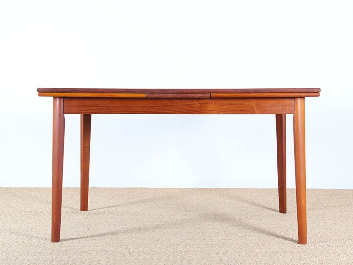 Scandinavian dining table in teak 4/8 people.