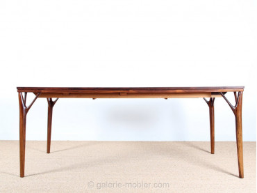 Scandinavian dining table in Rio rosewood 8/12 seats.