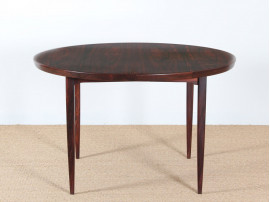 Extending circular dining table in rosewood 4/8 seats