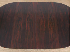 Extending circular dining table in rosewood 4/8 seats