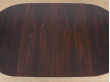 Extending circular dining table in rosewood 4/8 seats