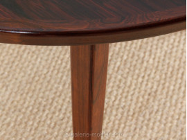 Extending circular dining table in rosewood 4/8 seats