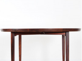 Extending circular dining table in rosewood 4/8 seats