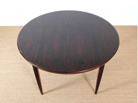 Extending circular dining table in rosewood 4/8 seats