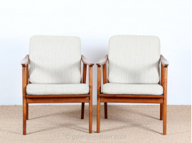 Pair of scandinavian teak and cane-back armchairs 