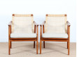 Pair of scandinavian teak and cane-back armchairs 