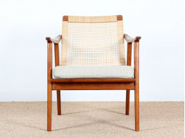 Pair of scandinavian teak and cane-back armchairs 