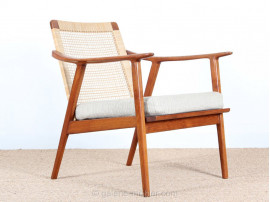 Pair of scandinavian teak and cane-back armchairs 