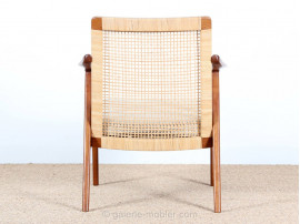 Pair of scandinavian teak and cane-back armchairs 