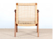 Pair of scandinavian teak and cane-back armchairs 