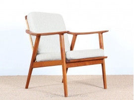 Pair of scandinavian teak and cane-back armchairs 