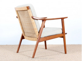 Pair of scandinavian teak and cane-back armchairs 