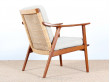 Pair of scandinavian teak and cane-back armchairs 