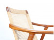 Pair of scandinavian teak and cane-back armchairs 