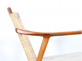 Pair of scandinavian teak and cane-back armchairs 