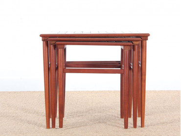 Danish mid-century modern nesting tables in teak and ceramic