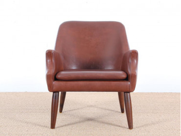 Fauteuil scandinave en cuir cognac