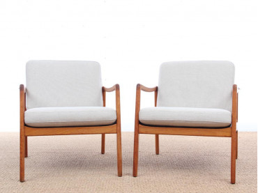 Mid-Century Modern Danish pair of  lounge chairs in teak model 110 by Ole Wanscher