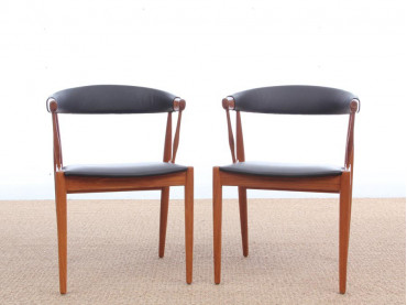 Mid century modern pair of armchair in teak and brown leather by Johannes Andersen