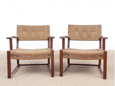 Mid-Century Modern pair of arm chairs  with woven sea grass.