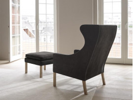 Fauteuil  scandinave modèle  2204 Wing chair. Edition neuve